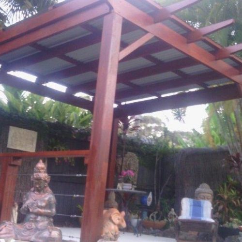 Timber Pergola with roof and wire fence
